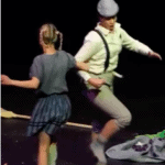 Picture of Gretel and Hansel dancing in the opera Hansel and Gretel